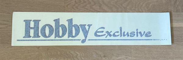 Logo til tag  - bagende - Hobby Exclusive - klistermærke